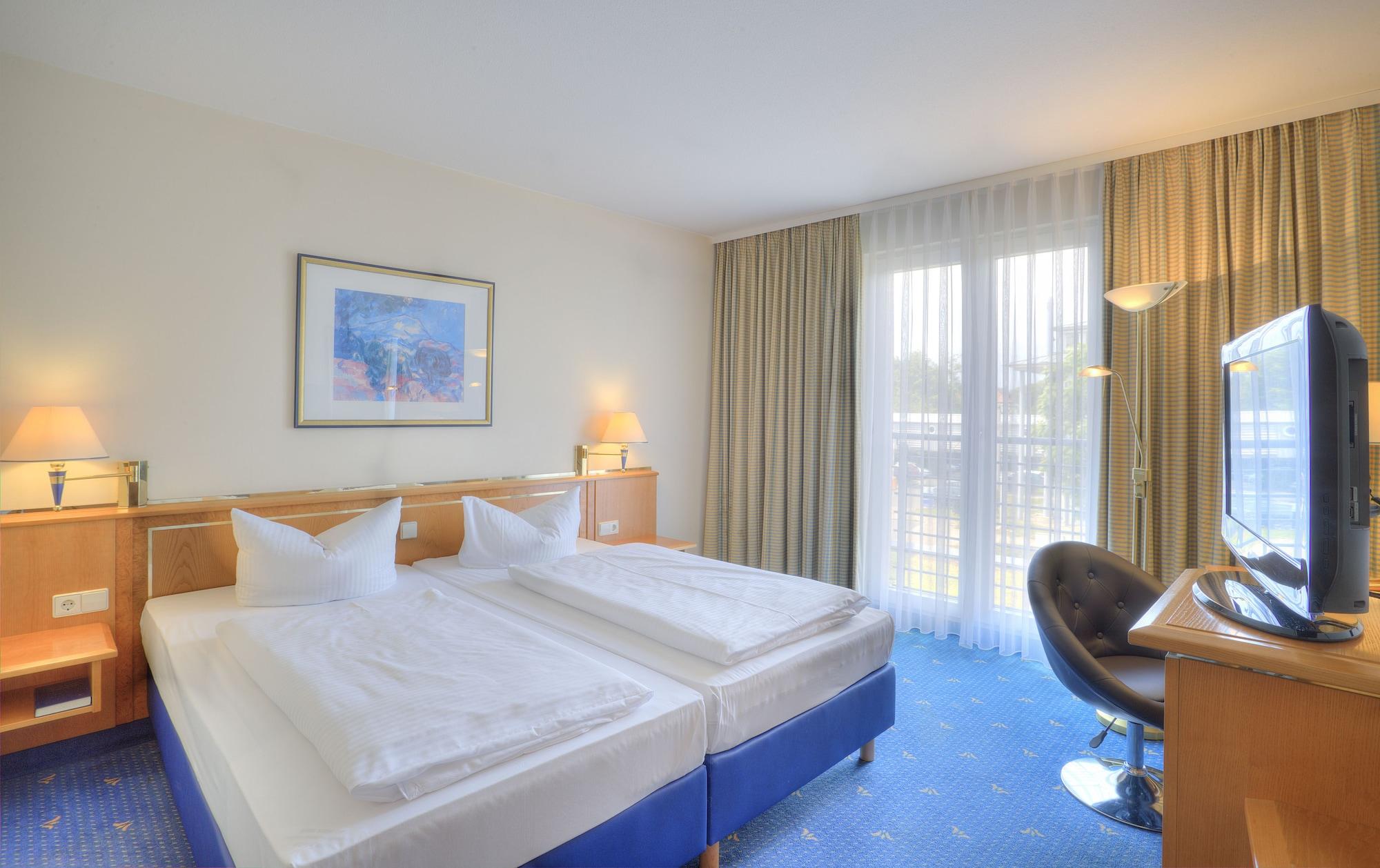 Achat Hotel Magdeburgo Habitación foto